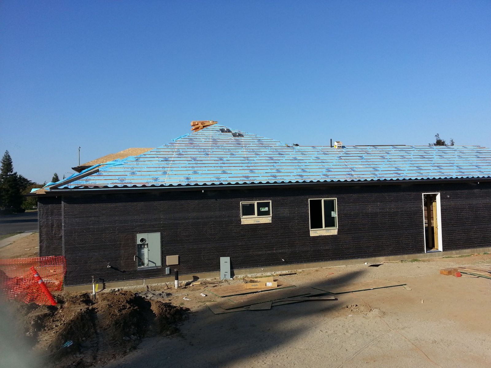 Residential roof replacement job in progress